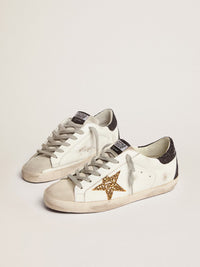 Golden Goose Sneakers Super-Star Donna in nappa con stella in glitter oro e talloncino in glitter nero